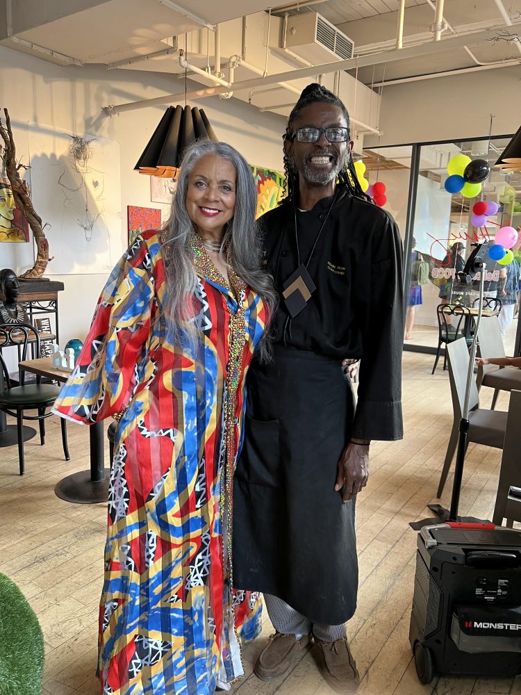 WKIM's Marsha Jews was a part of the art show yesterday. Kevin Brown (R) is the owner of Nancy by SNAC, the West North Avenue eatery that first featured "Dear Black Girl"