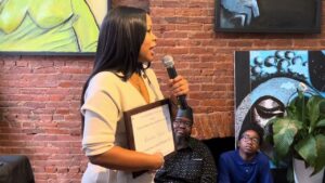 Charlyn Nater, Interim Main Streets Director, recognized with Joe Manns Black Wall Street Award