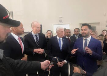 1.	White House Climate Advisor Ali Zaidi (right) speaks at Blink Charging’s facility opening alongside Governor Wes Moore (D, left) and Congressman Steny Hoyer (D, center)
(Richard D. Elliott/BayNet)