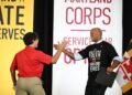 Gov. Moore greets a corps member