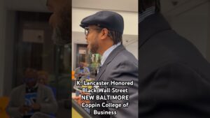 Larry introduces his wife, K. Lancaster, at Black Wall Street NEW BALTIMORE Coppin State University