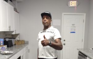 From Surviving to Serving: Darryl Green Honored at Black Wall Street WOODLAWN